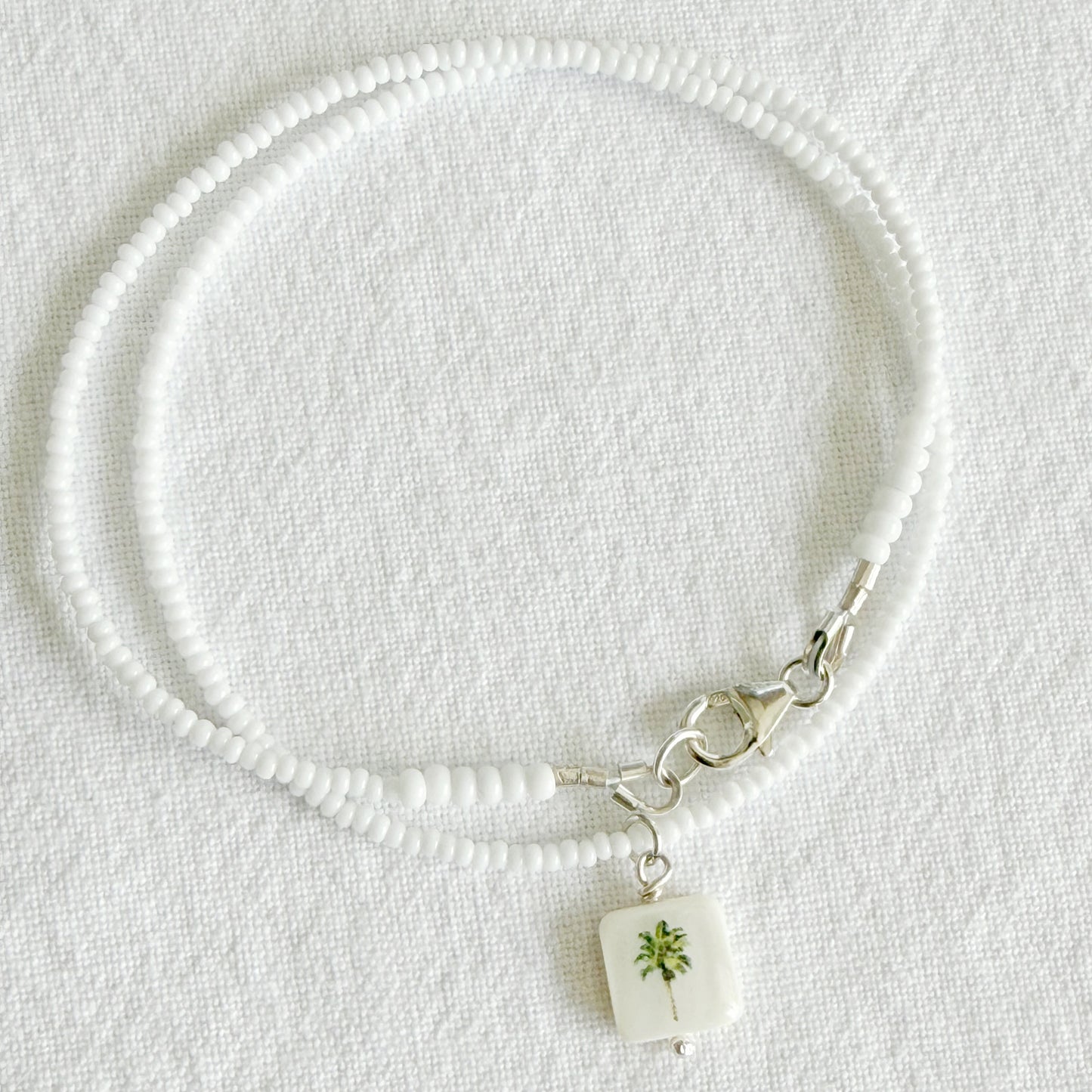 Palm Tree on White Glass beaded necklace