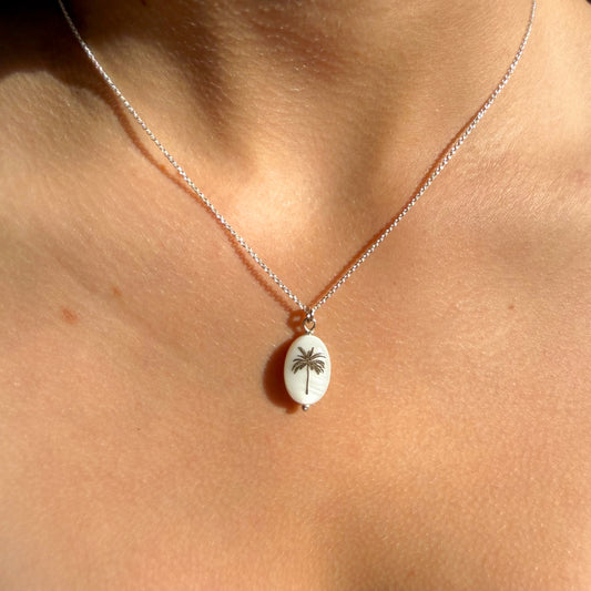 Silhouette oval palm tree on sterling silver chain