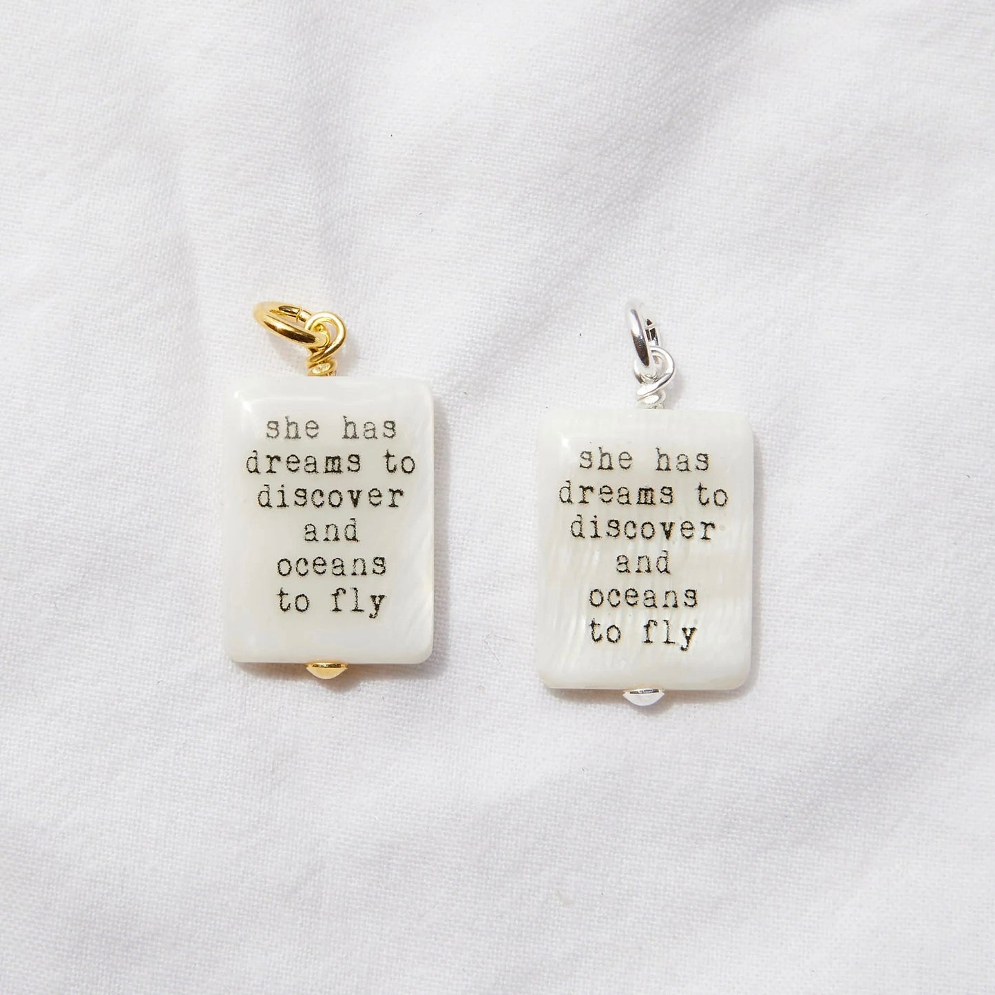 She has dreams to discover and oceans to fly pendant