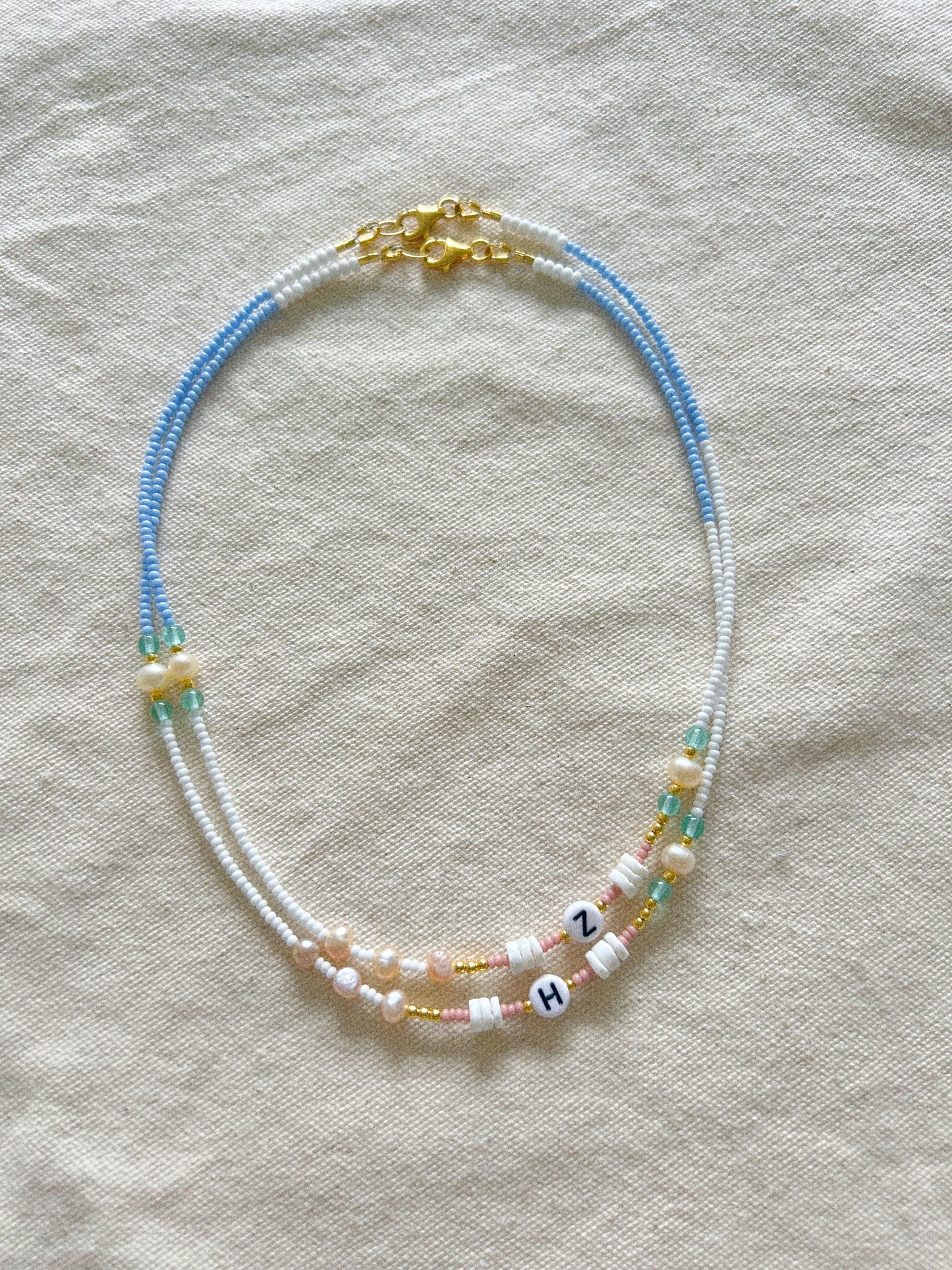 Collier Océan avec initiale Plaqué Or 24k