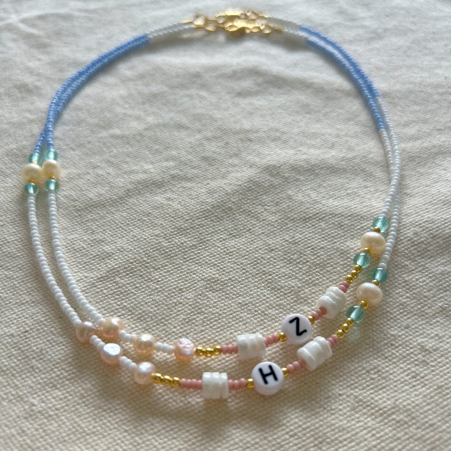 Collier Océan avec initiale Plaqué Or 24k