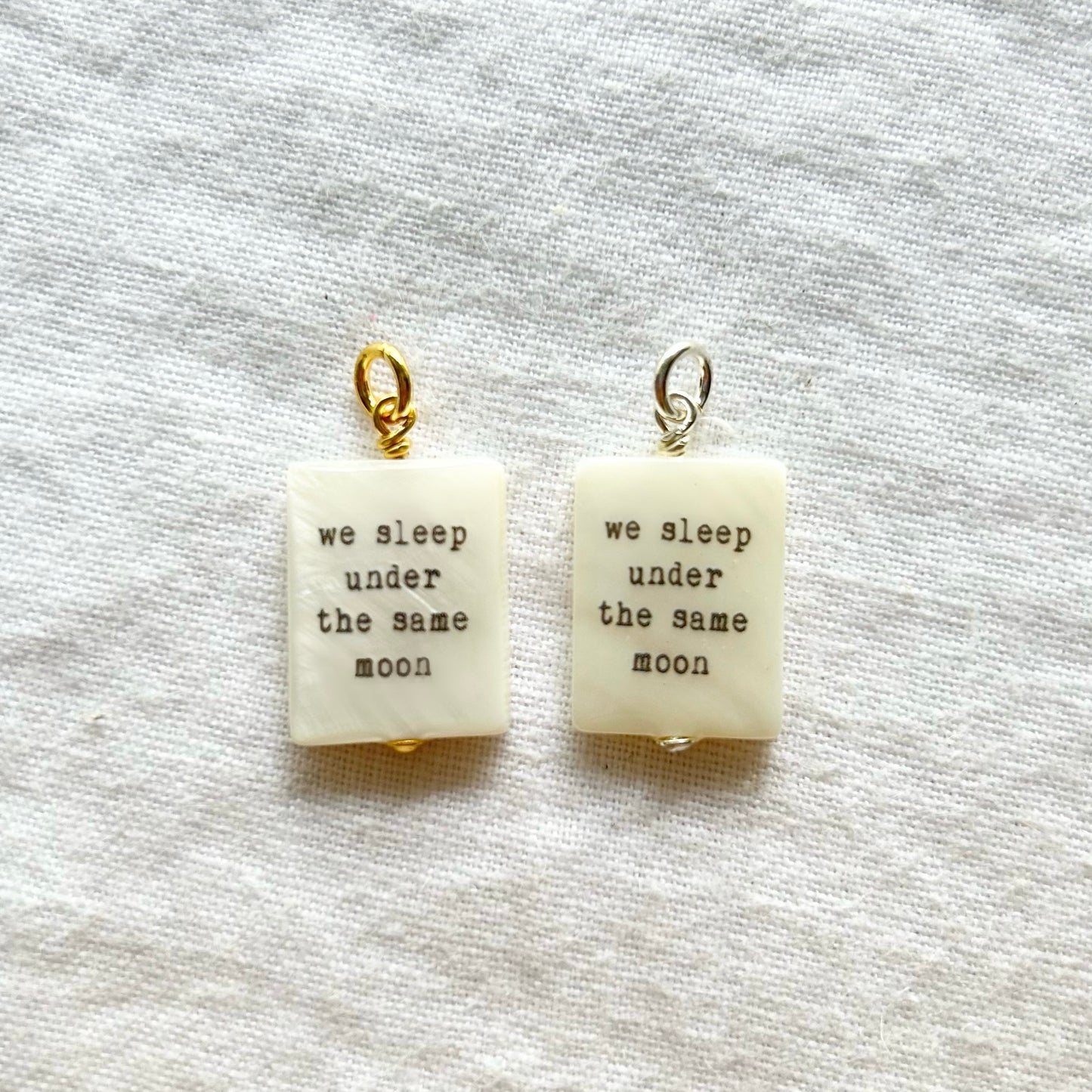 We sleep under the same moon pendant