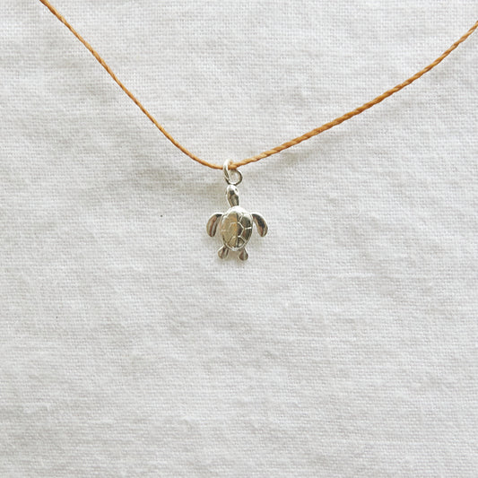 Turtle on cord necklace sterling silver