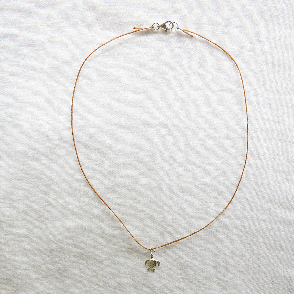 Turtle on cord necklace sterling silver