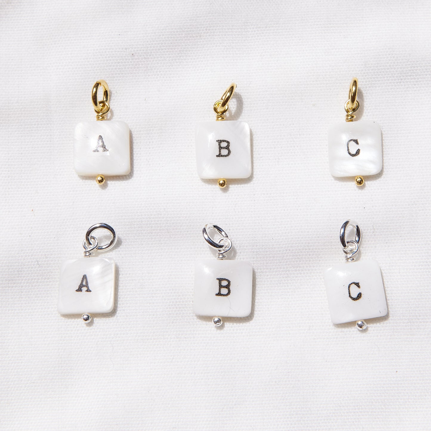 Pendentif petite lettre en argent sterling