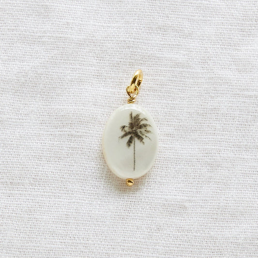 Breeze palm tree oval pendant
