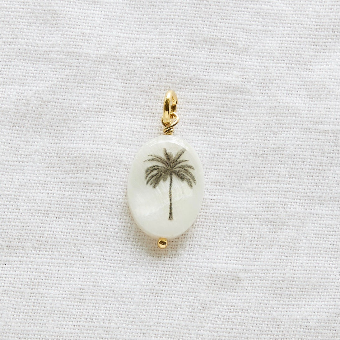 Pendentif ovale silhouette palmier