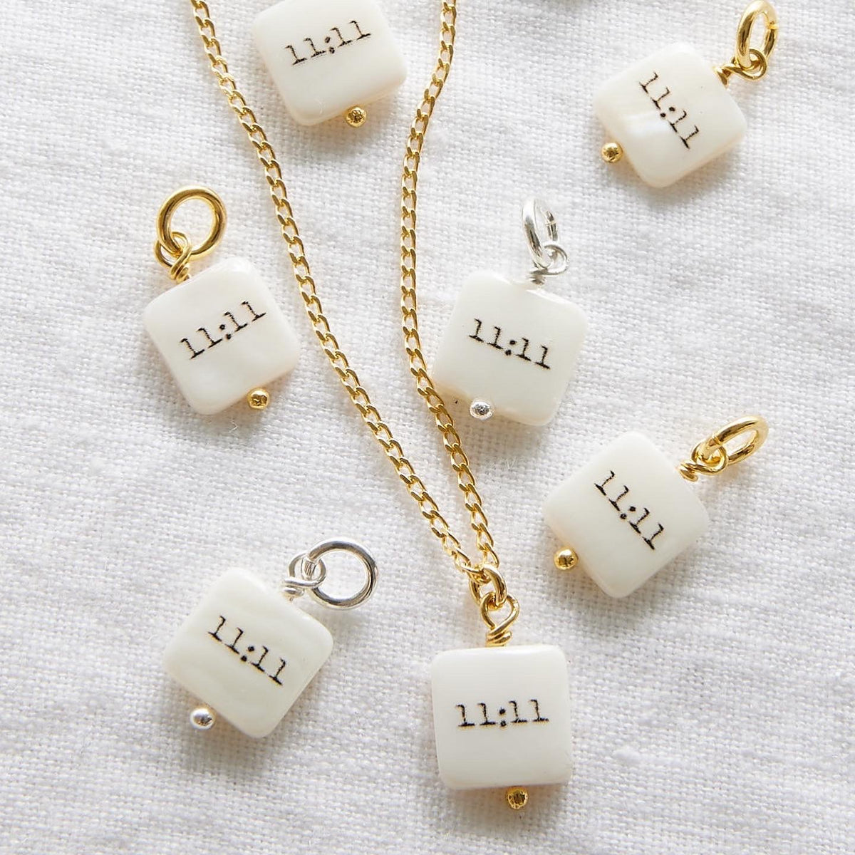 11:11 PENDANTS
