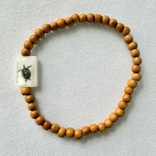 Wooden bracelet with turtle