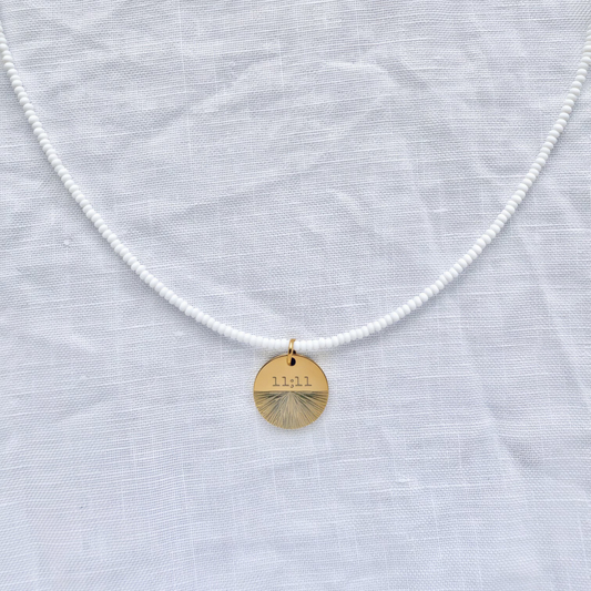 11:11 Pendant on white glass beads