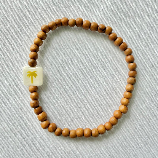 Wooden bracelet with gold palm tree
