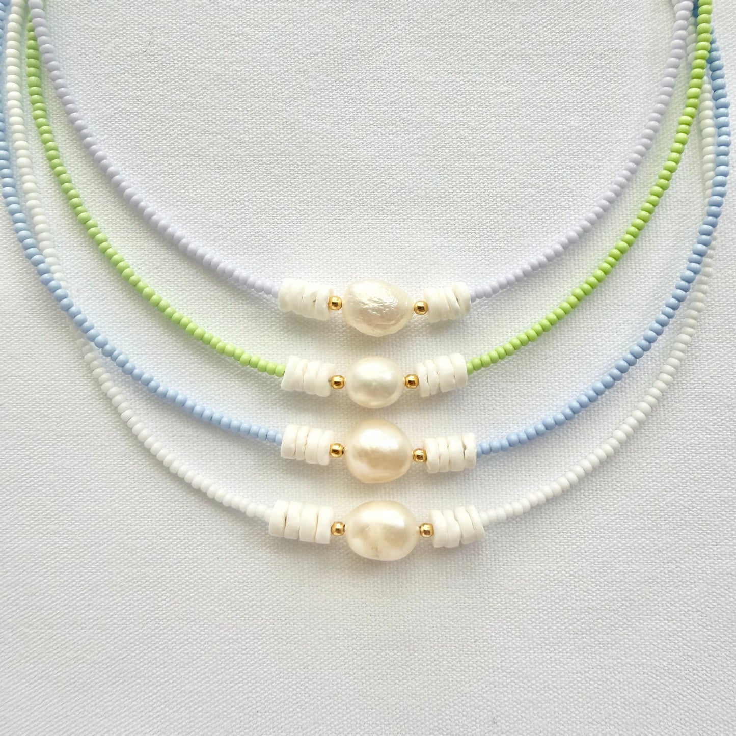 Freshwater pearl and shell necklaces