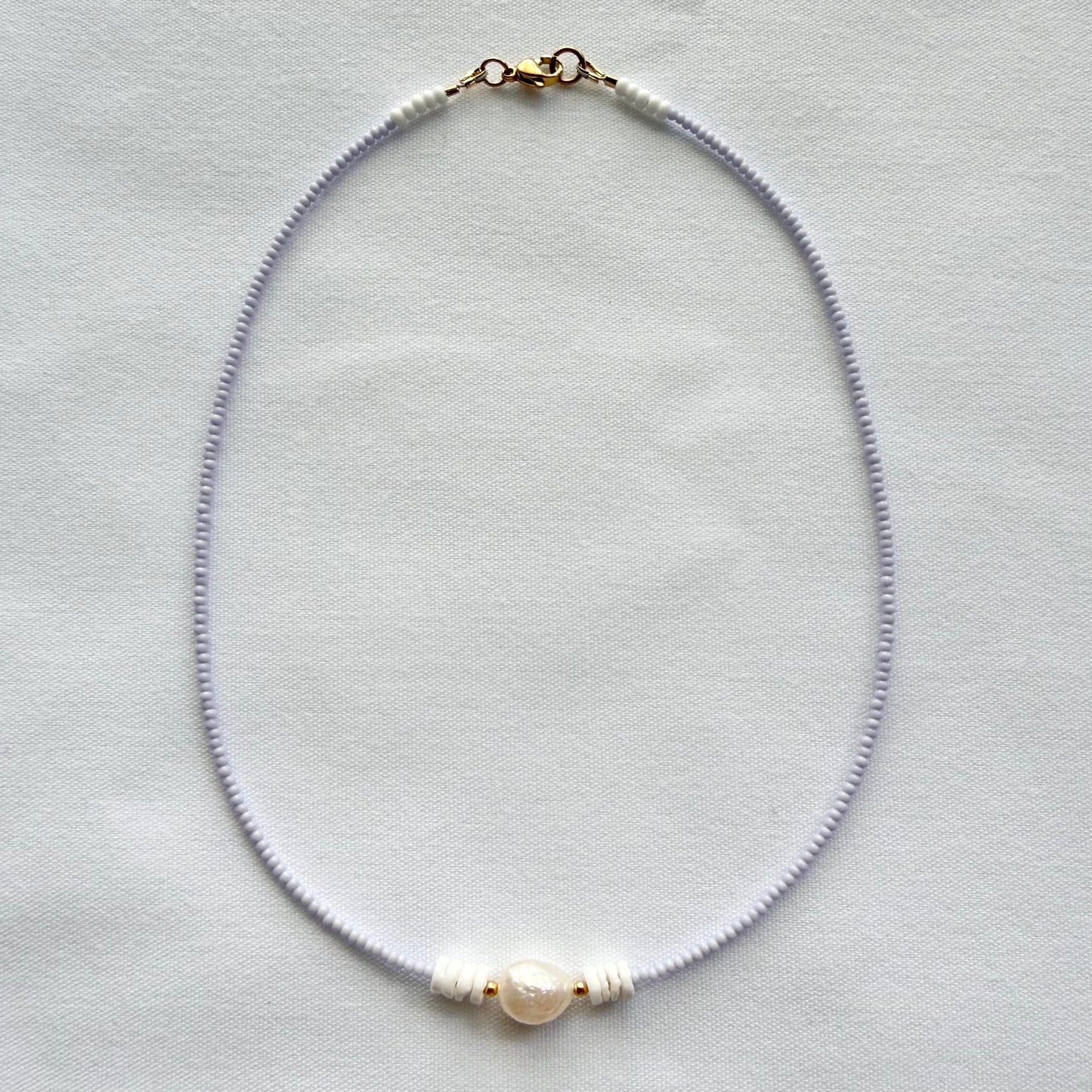 Freshwater pearl and shell necklaces