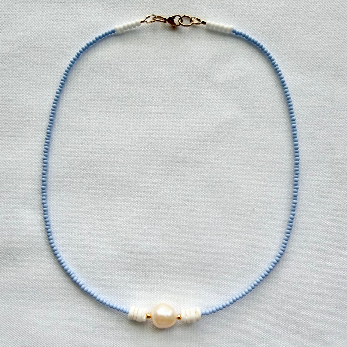 Freshwater pearl and shell necklaces