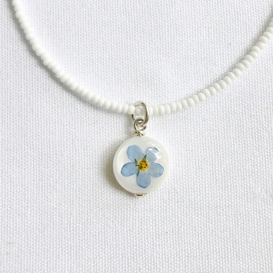 Circle forget-me-not necklace