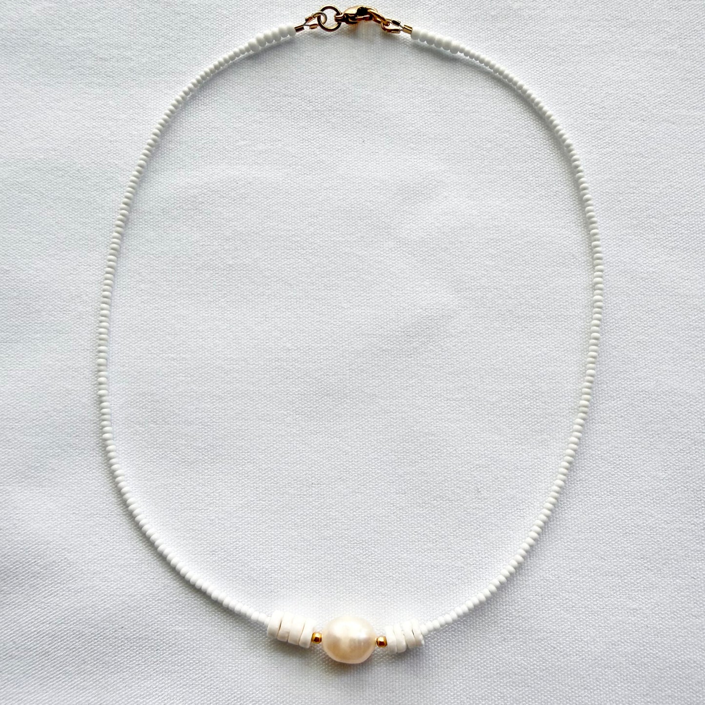 Freshwater pearl and shell necklaces