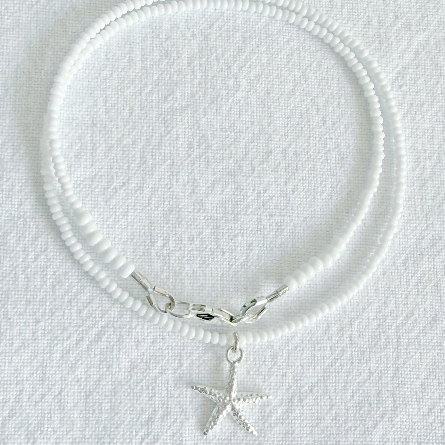 Starfish on white glass beaded necklace