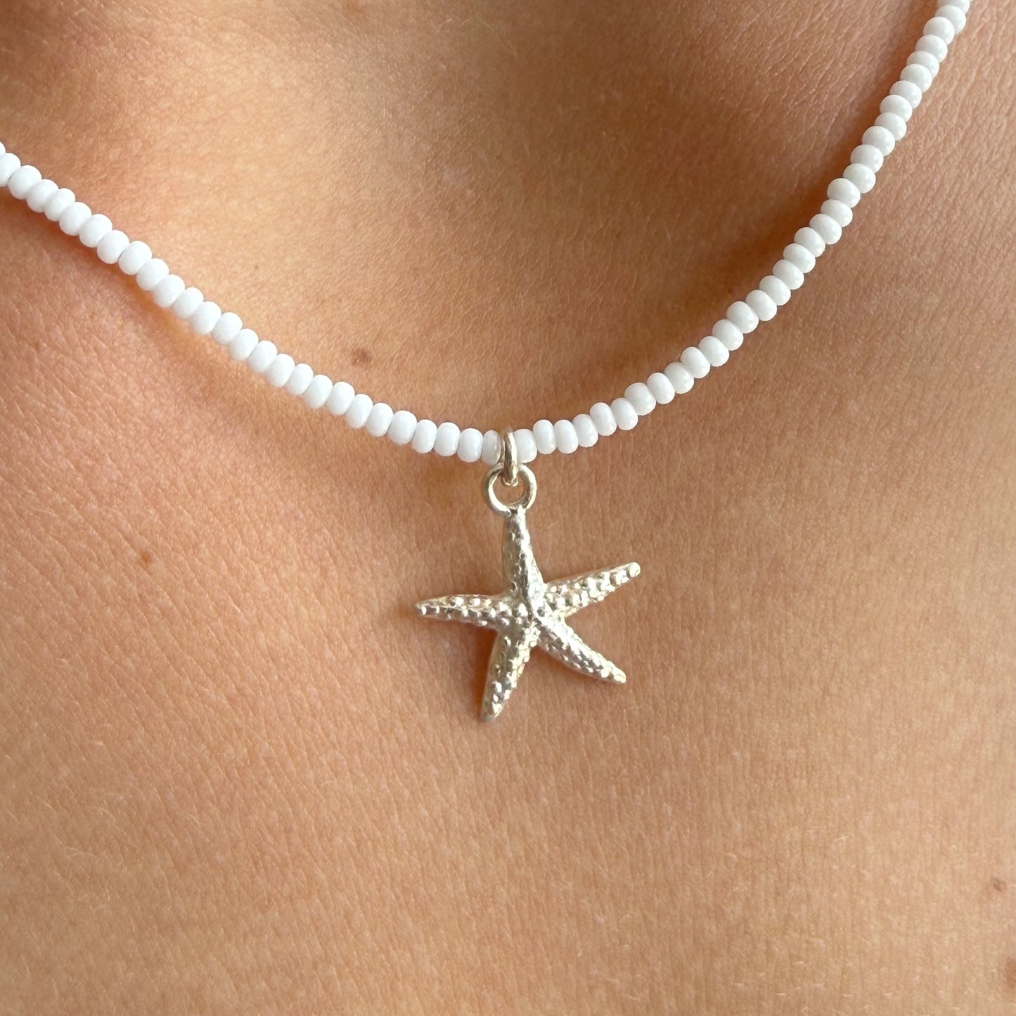 Starfish on white glass beaded necklace