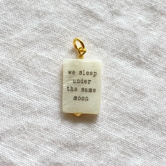 We sleep under the same moon pendant