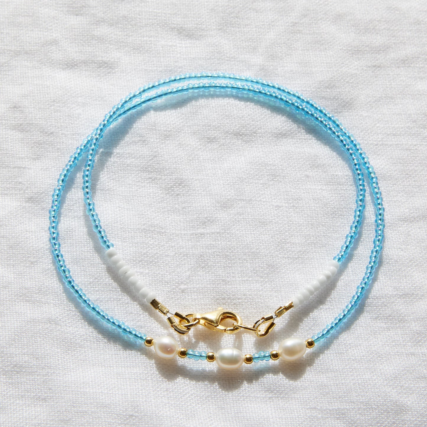 Rainbow sky blue beaded necklace with cultured freshwater pearls